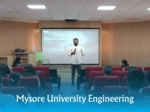 Trainer presenting to learners in a university classroom